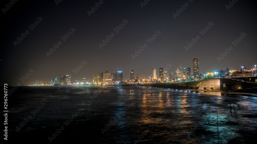 Waterfront of Tel Aviv city coastline. Night view from Jaffa. Israel