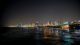 Waterfront of Tel Aviv city coastline. Night view from Jaffa. Israel