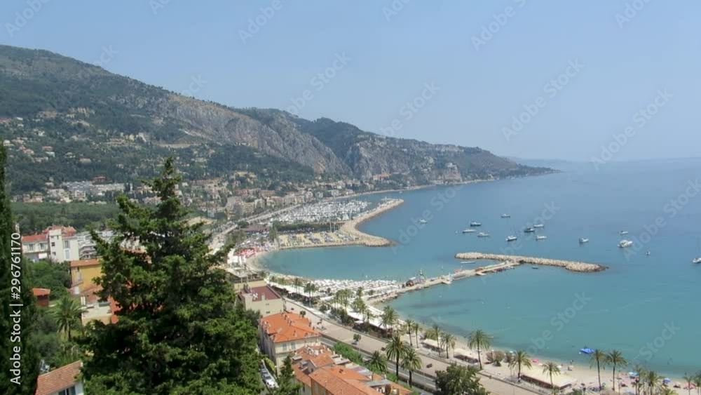 Panoramic view above the roofs of the historic city Menton and the Mediterranean. Panoramic view above the roofs of the historic city Menton and the Mediterranean.