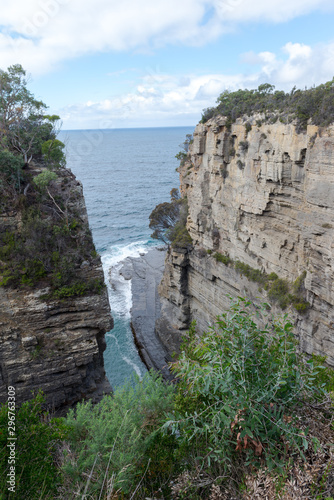 Tasmans Arch  former sea cave  geological formations at Tasman National Park  Tasmania  Australia.   