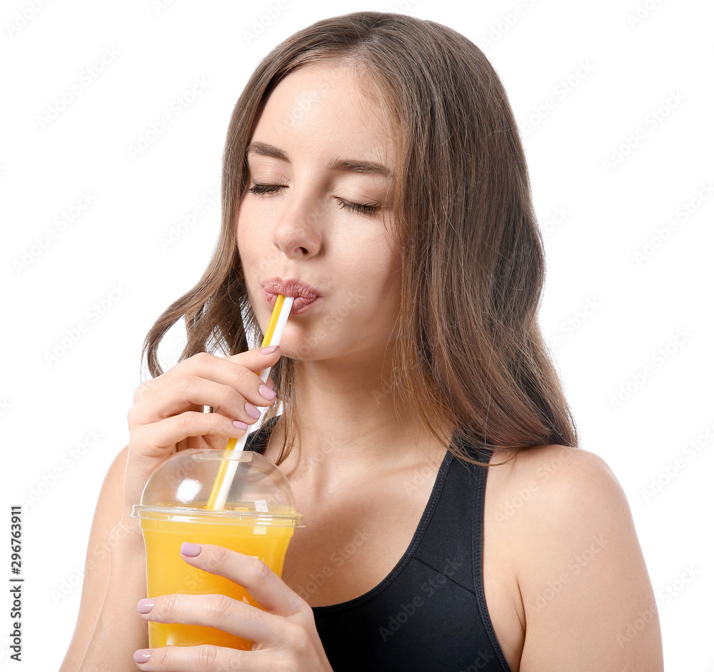 Beautiful young woman with orange juice on white background Beautiful young woman with orange juice on white background
