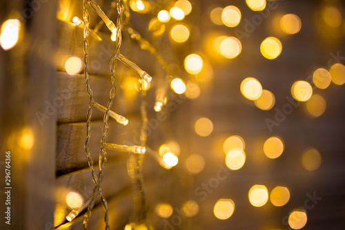 Christmas background - close up of garland lights with bokeh effect photo