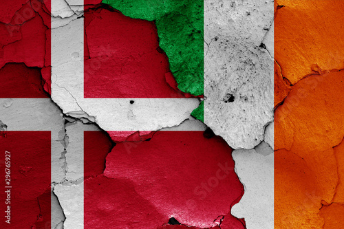 flags of Denmark and Ireland painted on cracked wall