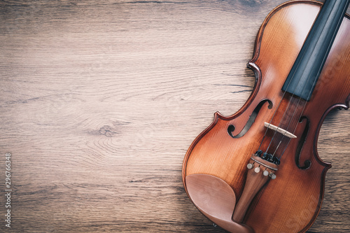 Obraz na plátně classical violin on wooden floor. music background