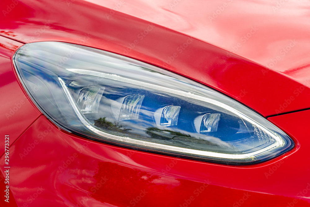 Front light of a red car