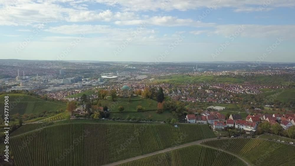 Aerial of the Grave Chapel (Grabkapelle) on Rotenberg and surrounding industrial area with museums and soccer stadium on a beautiful autumn day in Stuttgart, Germany
