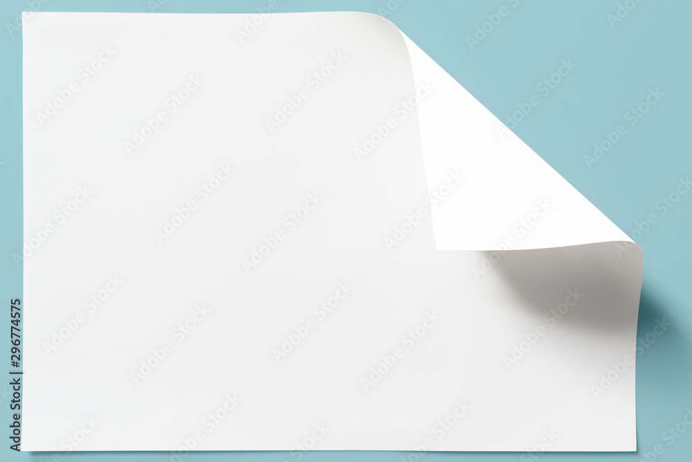 White sheet of paper, curled corner. White sheet of paper, curled corner.