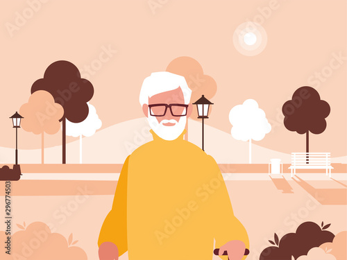 old man walking in park in the city