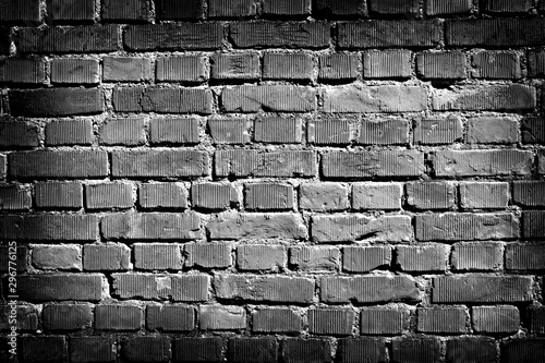 close up on a black and white bricks wall
