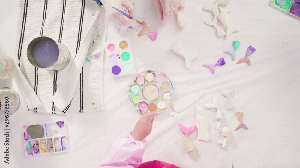 Flat lay. Step by step. Painting mermaid tails and seashells with acrylic paint to decorate Halloween pumpkins. Flat lay. Step by step. Painting mermaid tails and seashells with acrylic paint to decorate Halloween pumpkins.