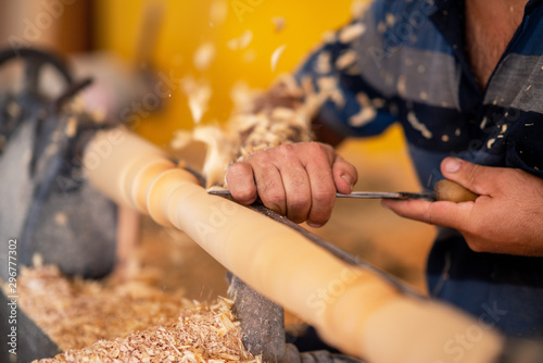 Konstfotografi Carpenter working on wood to carving and shaping