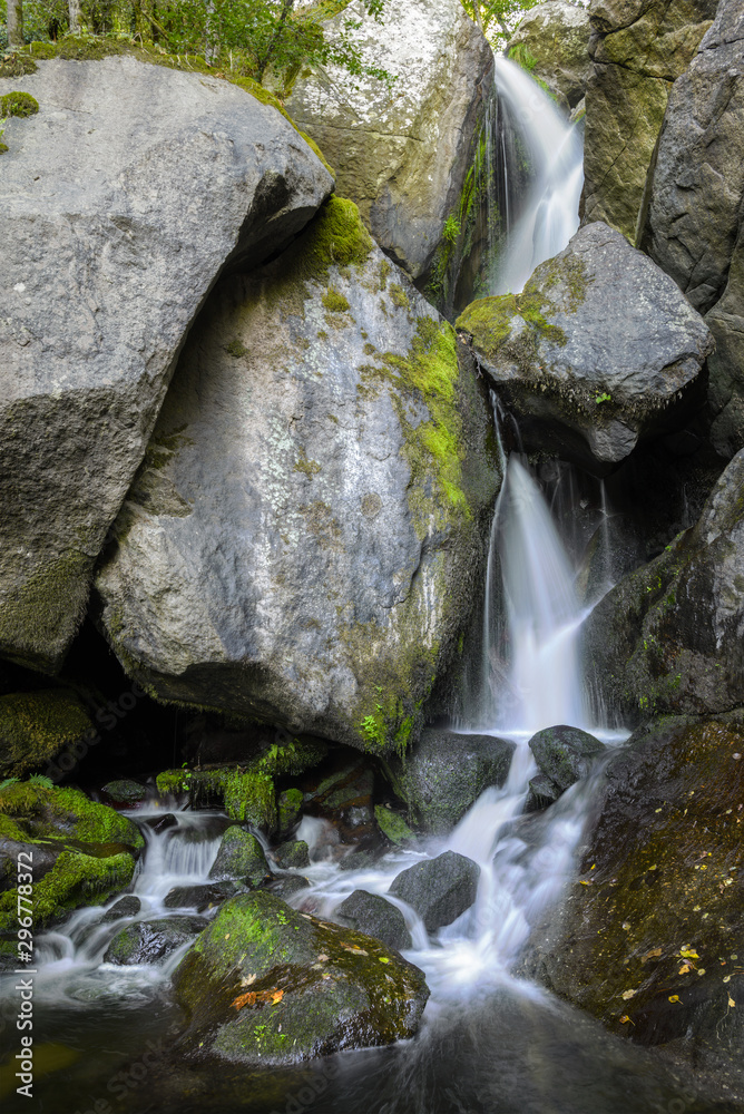 Waterfall between Gigantic Granitic Boulders Waterfall between Gigantic Granitic Boulders