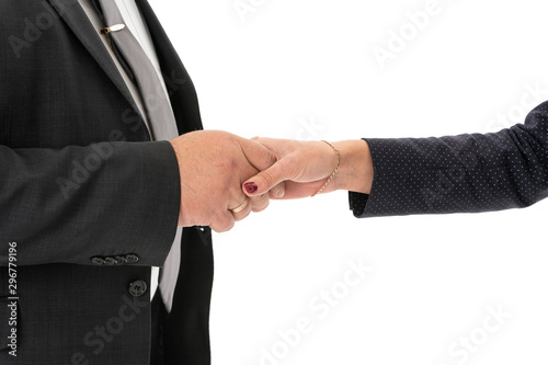 Hand shake between a businessman and a businesswoman isolated on white