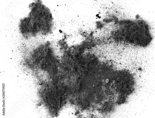 Black trash, dust, dirt isolated on a white background closeup. texture of garbage from a vacuum cleaner