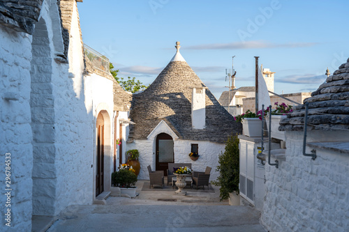 Trulli of Alberobello. View of Trulli houses .The traditional Trulli houses in Alberobello city, Puglia, Italy - April 30, 2019: Church in Trullo Parish Sant'Antonio of Padua - Immagine