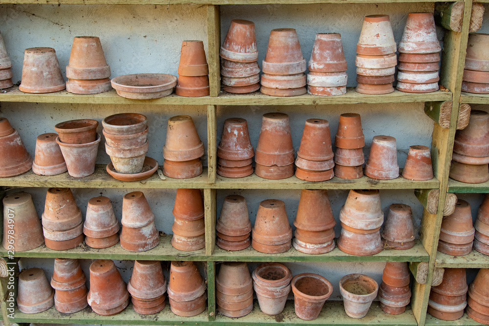 old clay flower pots on a shelf