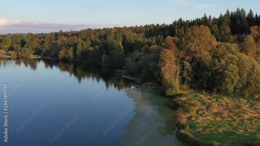 Aerial View at Mountain Lake with Blue Sky in British Columbia, Canada. 4K. Aerial View at Mountain Lake with Blue Sky in British Columbia, Canada. 4K.
