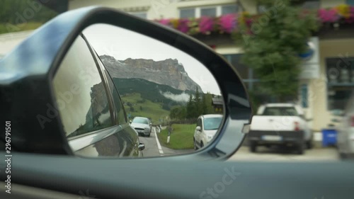 Car mirror shot, forest, nature, mountains. Frazione Braies di Fuori. Incredible scenery. Driving, 
 photo