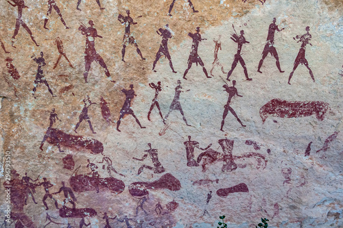 San bushman rock painting of a large group of people