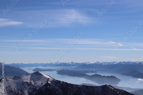 view over snow capped mountains and Lago Nahuel Huapi 