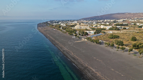 Aerial drone photo of famous volcanic beach and bay of Perissa village, Santorini island, Cyclades, Greece © aerial-drone