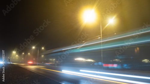 Traffic in the city fog at night