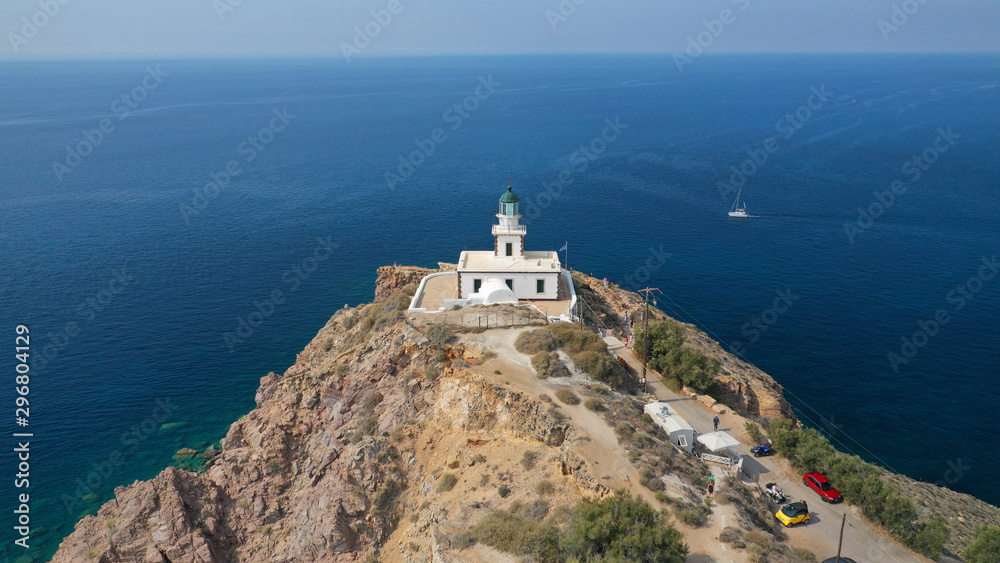 Aerial drone photo of iconic lighthouse of Akrotiri near Akrotiri village, Santorini island, Cyclades, Greece