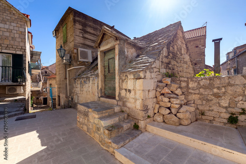 Old street in Omis city on a sunny day. photo