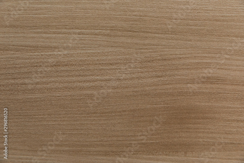 Light brown warm-toned wood texture background surface with gentle natural pattern