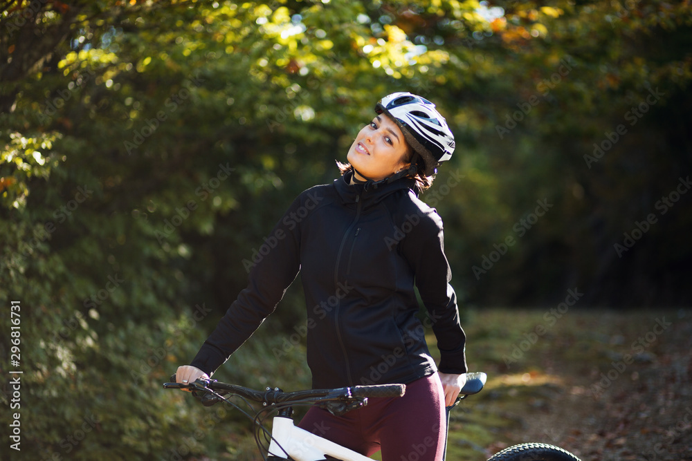 Female cyclist enjoying in a ride Female cyclist enjoying in a ride