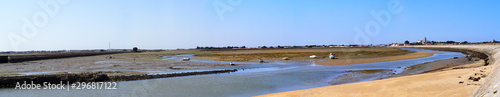 panoramic view of the entrance of the port and the Jacobsen pier of the village of Noirmoutier, on the Atlantic coast in western France photo