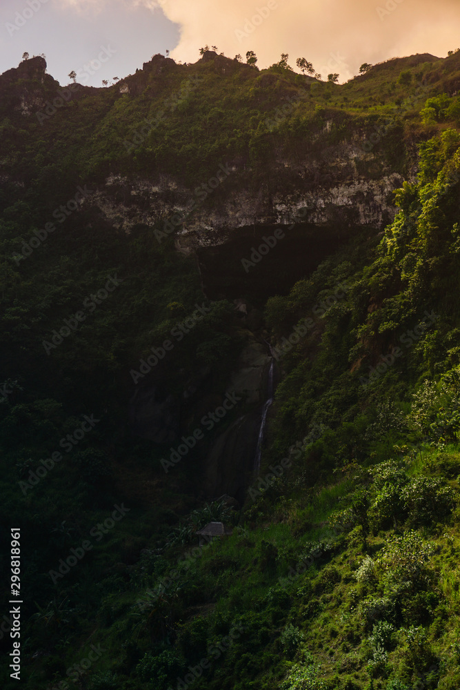 Beautiful landscape waterfall Sawangan. A unique waterfall coming from a cave in Kebumen, Central Java, Indonesia Beautiful landscape waterfall Sawangan. A unique waterfall coming from a cave in Kebumen, Central Java, Indonesia