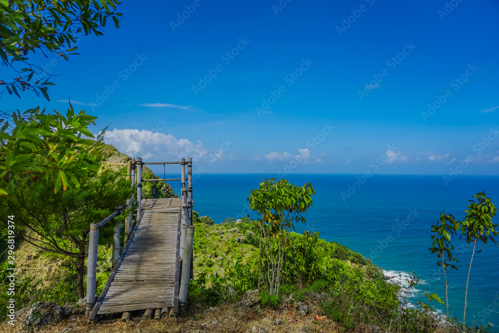 Beautiful landscape of Sawangan Hills with an Indian Ocean background in Kebumen, Central Java, Indonesia