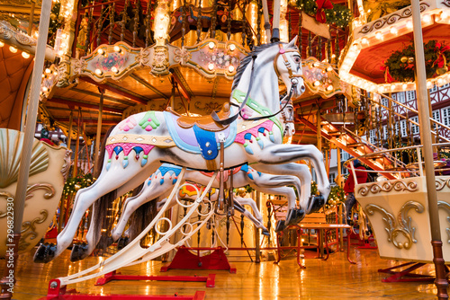 Merry-go-round ride in amusement park photo