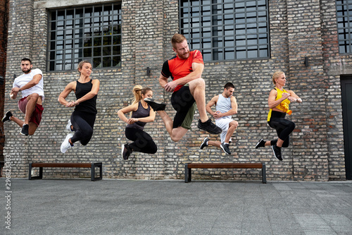 Athletes jumping during a workout session