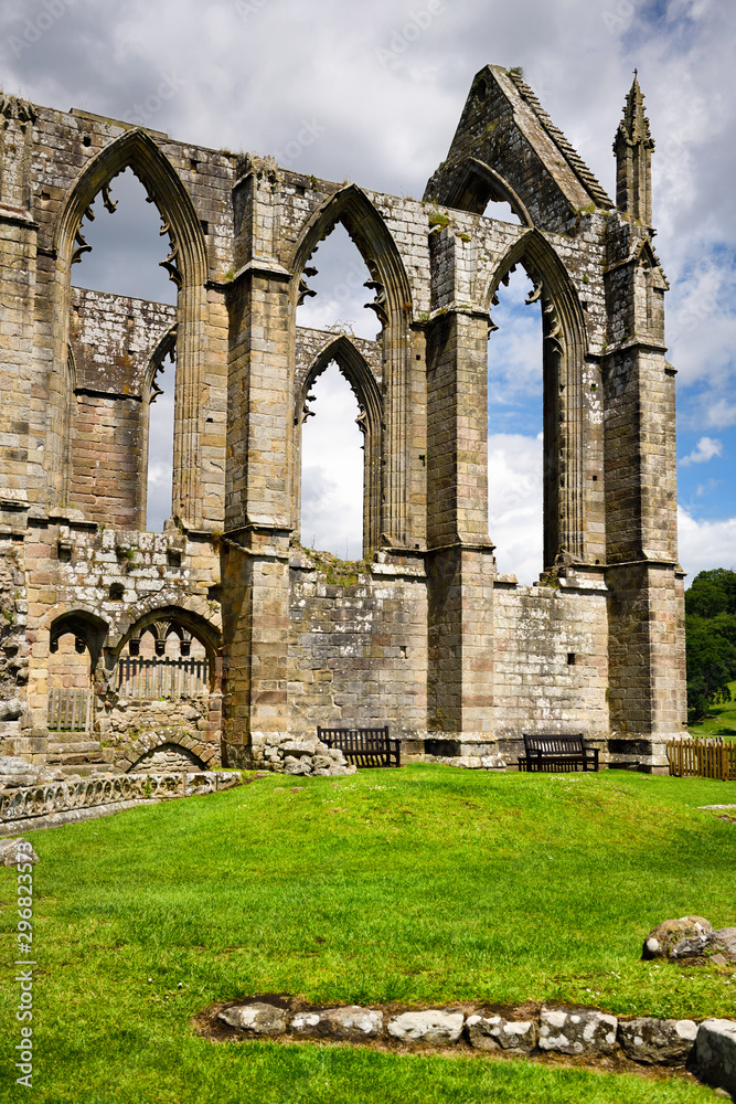 Empty stone window ruins of Bolton Priory church a 12th century Augustinian monastery at Bolton Abbey Wharfedale North Yorkshire England