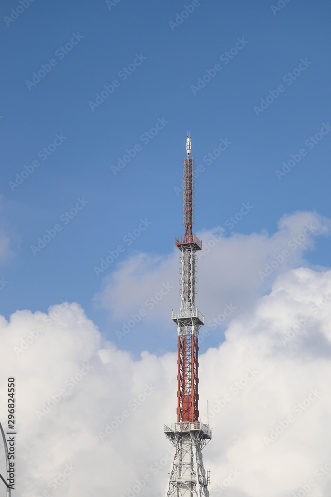 Cellular Heavy Duty Transmitter Signal Electric Telephone Transmitter Towers and Blue Sky Standalone Close Up