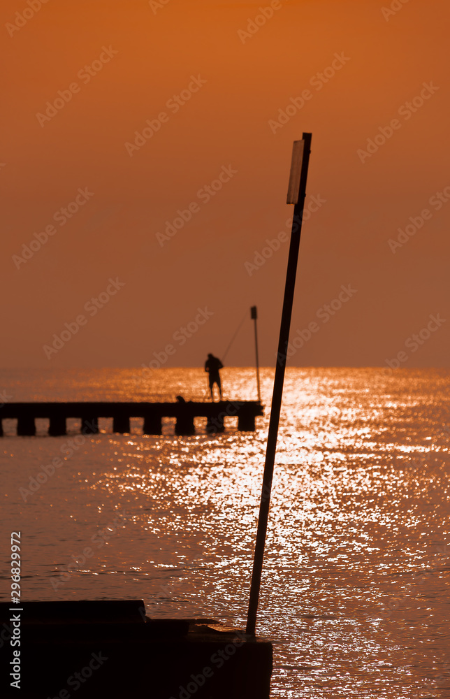 fishing at sunrise