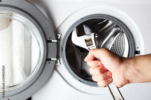 washing machine spanner repair hand