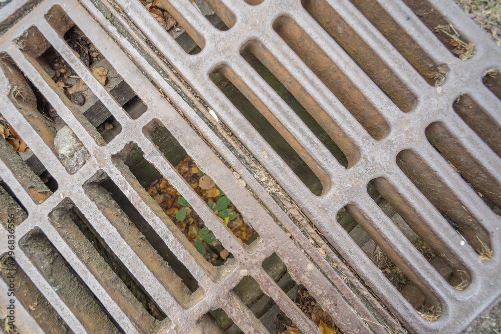 Metal sewer grate from above