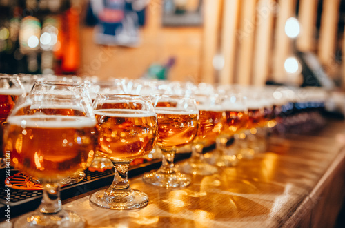 Set of glasses of beer in pub or restaurant