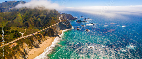 Magical aerial view of the route 101 by the Californian Pacific Coast on the way from Los Angeles to San Francisco near Big Sur Bixby Bridge.