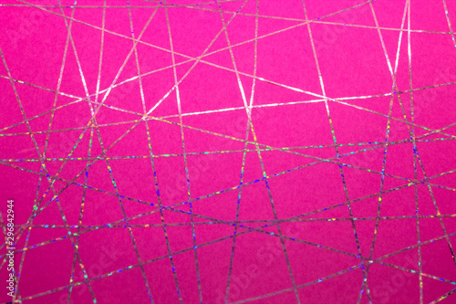 This is a photograph of a geometric design created using metallic pink tape applied onto a fuschia Pink paper