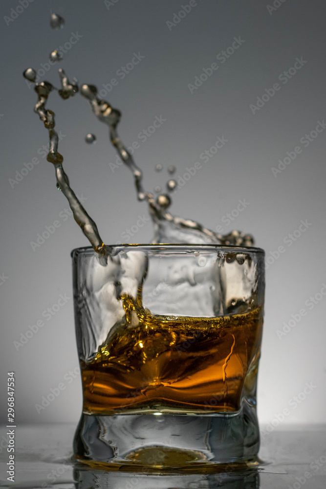 Whiskey squirts from the glass Whiskey squirts from the glass