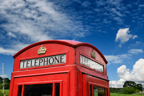 Top of red British telephone booth in the English countryside at Bolton Abbey in Wharfedale North Yorkshire England