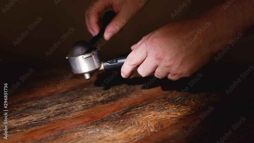 Preparing an espresso, pillaging the coffee Preparing an espresso, pillaging the coffee