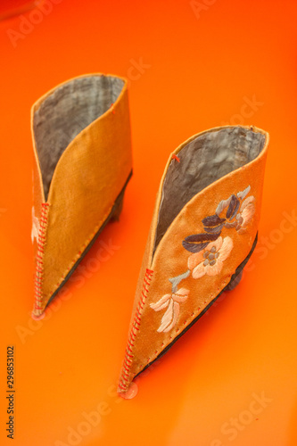 orange asian shoes for lotus feet