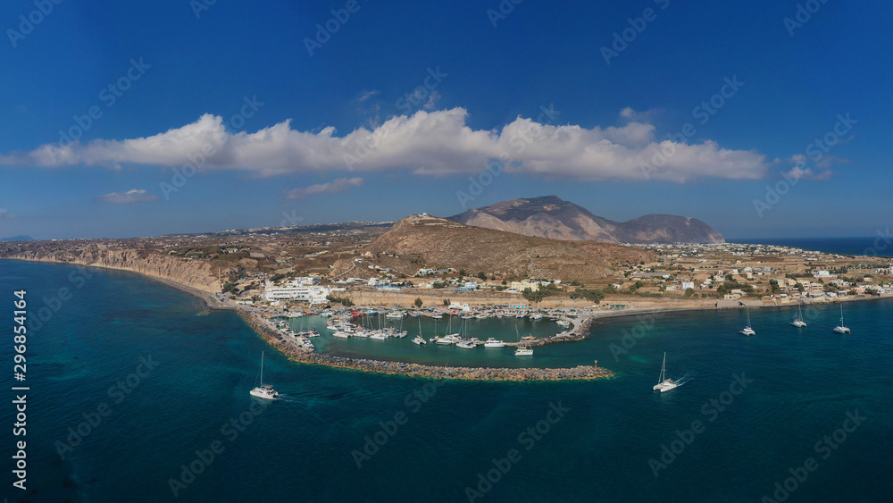 Aerial drone photo of famous round port of Vlychada, Santorini island, Cyclades, Greece