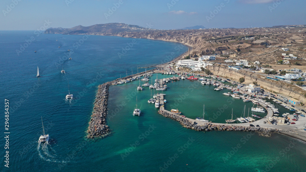 Aerial drone photo of famous round port of Vlychada, Santorini island, Cyclades, Greece