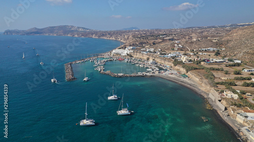 Fototapeta Naklejka Na Ścianę i Meble -  Aerial drone photo of famous round port of Vlychada, Santorini island, Cyclades, Greece